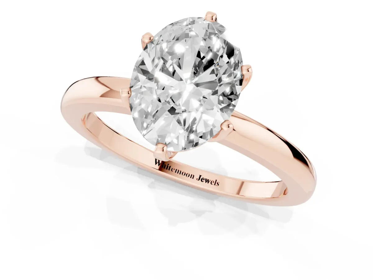 Oval Cut Solitaire Diamond Ring with Six-Prong Setting on a Classic Band Rose gold