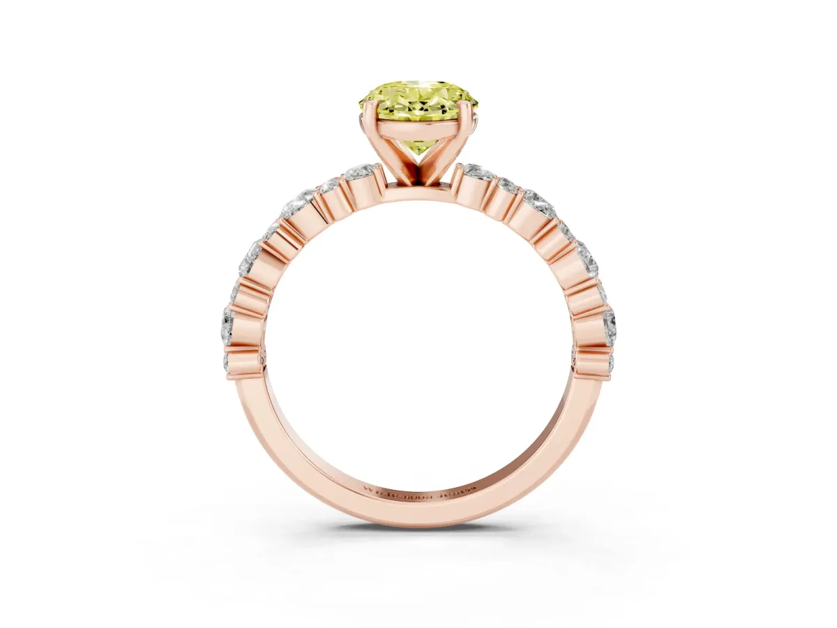 Fancy Yellow Oval Cut Diamond Side Stone Solitaire Ring with Round and Four-Prong Setting Rose gold