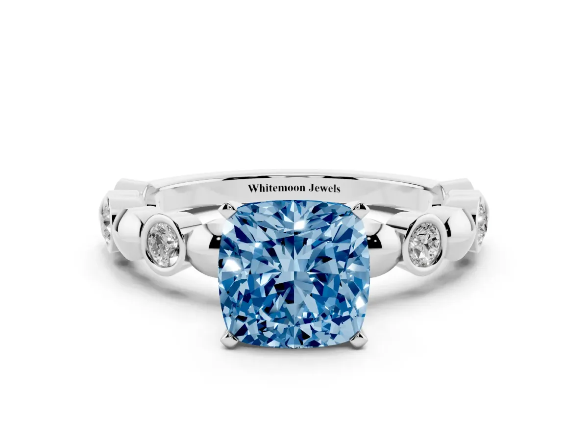 Fancy Blue Cushion Cut Solitaire Bezel-Set Diamond Ring with Beaded Band and Four-Prong Setting Silver