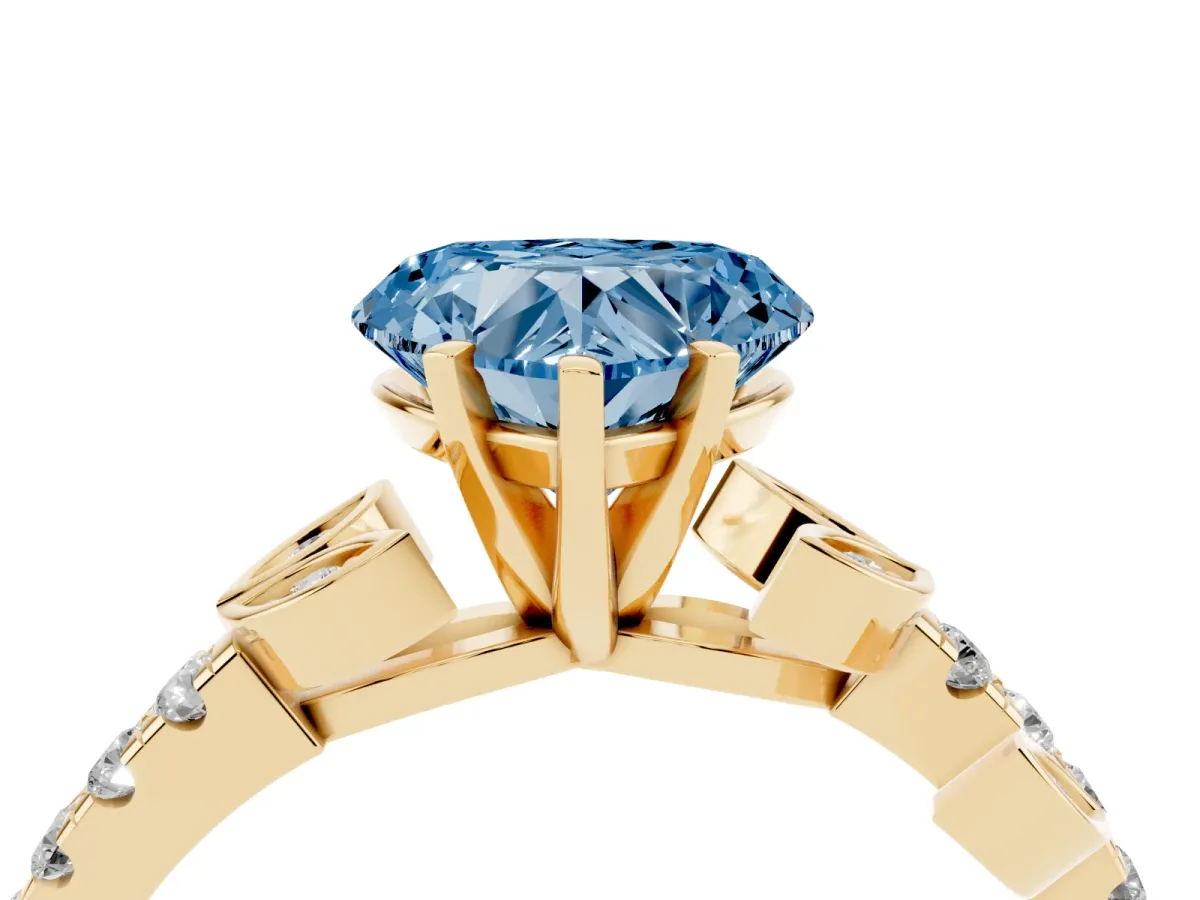 Fancy Blue Heart Cut Solitaire Leaf-Inspired Diamond Ring with Pavé Band and Four-Prong Setting Yellow gold