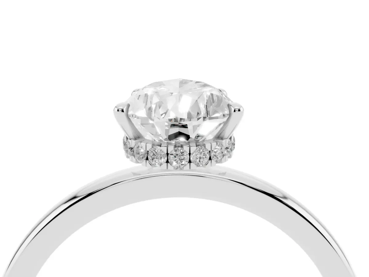 Pear Cut Solitaire Engagement Ring with Cathedral Band and Four-Prong Setting Silver