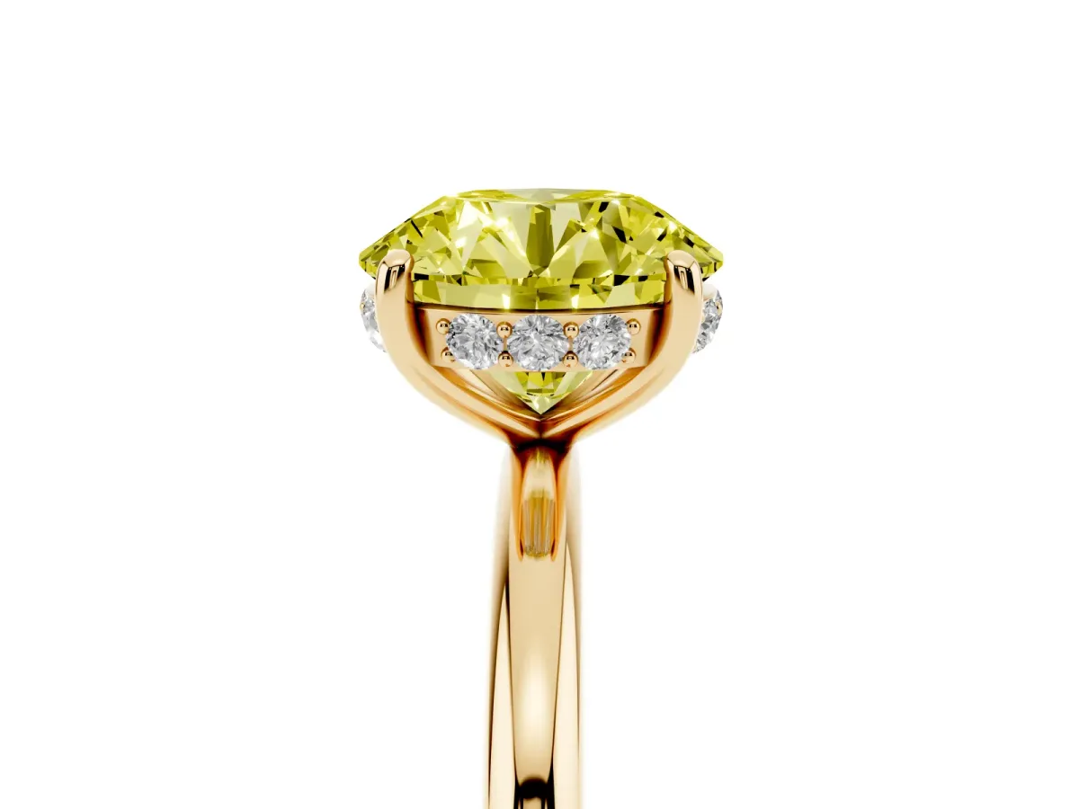 Fancy Yellow Round Cut Solitaire Diamond Ring with a Classic Band and Four-Prong Setting Yellow gold