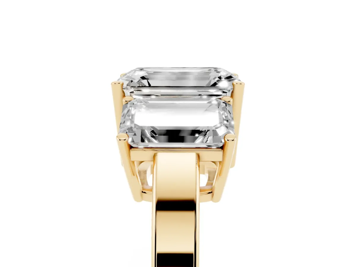 Three-Stone Emerald Cut Cut Diamond Engagement Ring with Flat Band and Four-Prong Setting Yellow gold