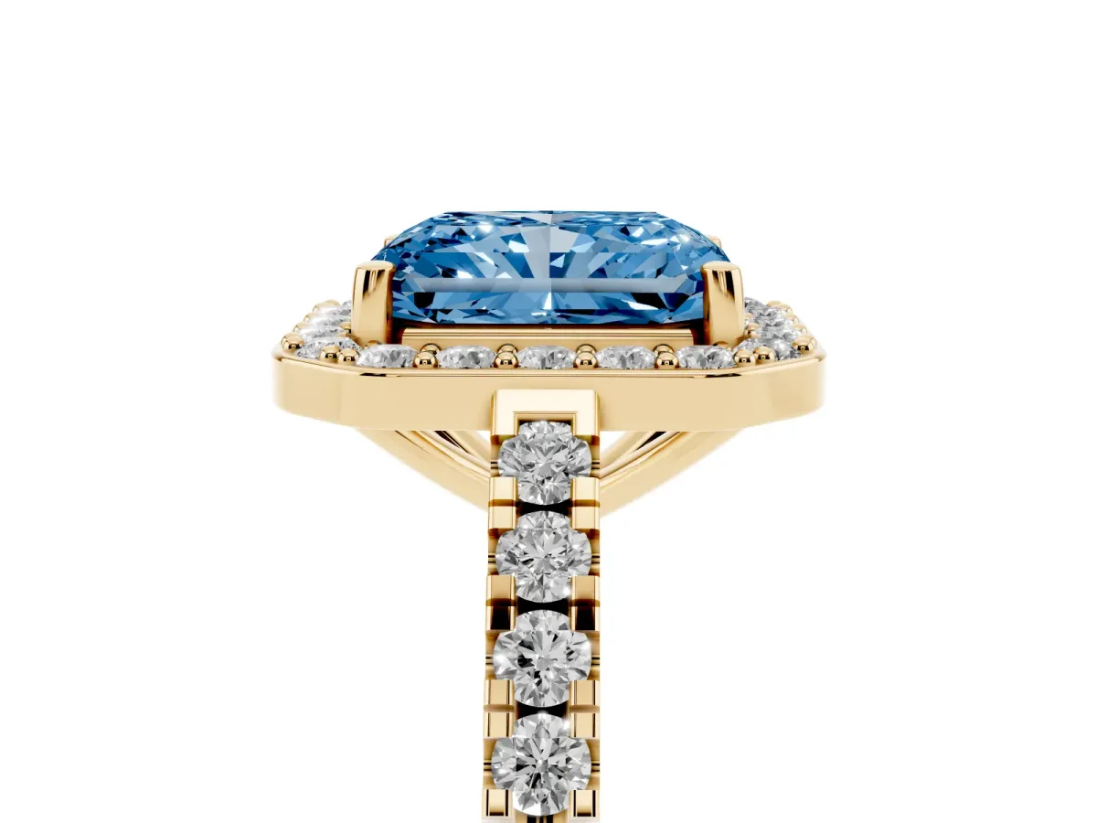 Fancy Blue Radiant Cut Diamond Halo Ring with Round Pavé Split Shank and Prong Setting Yellow gold