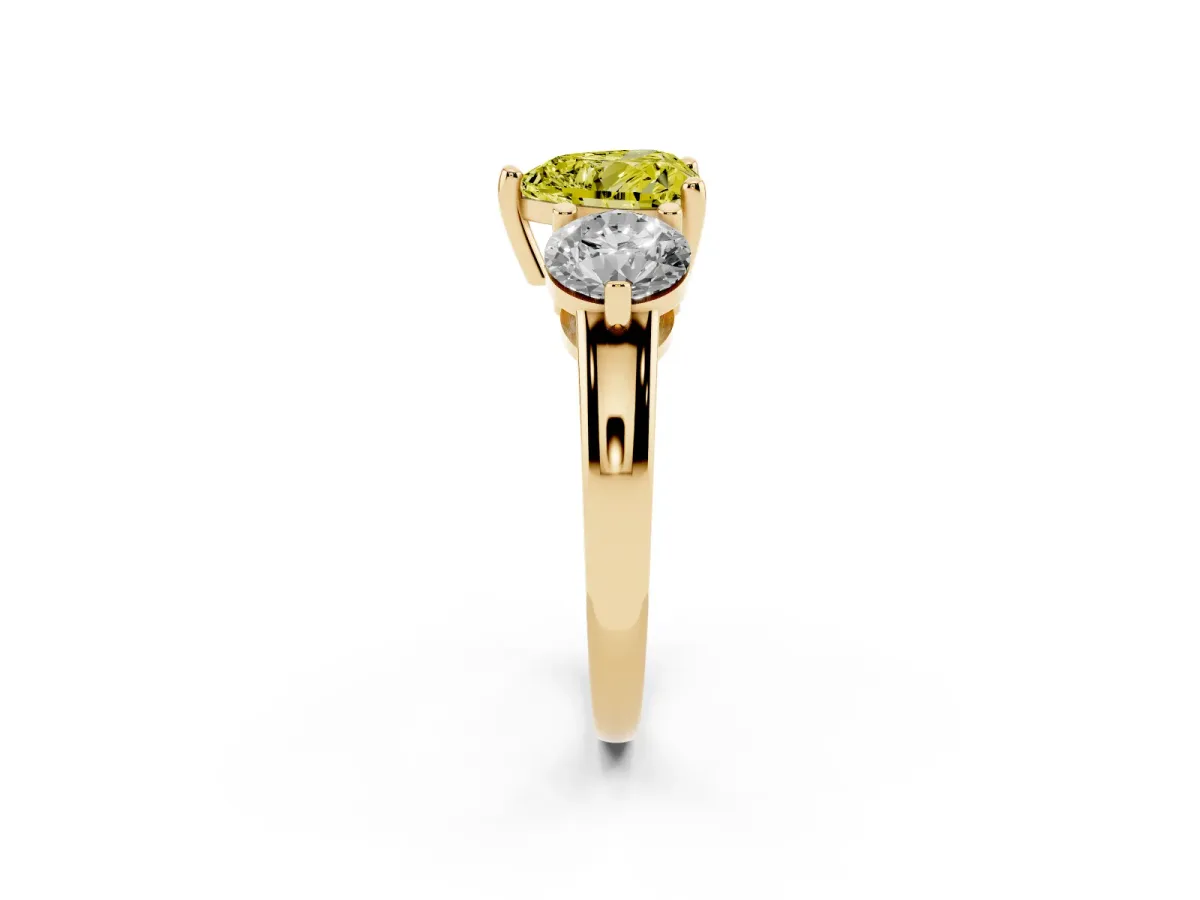 Fancy Yellow Three-Stone Heart Cut Brilliant Cut Solitaire Ring with Prong Setting on a Classic Band Yellow gold