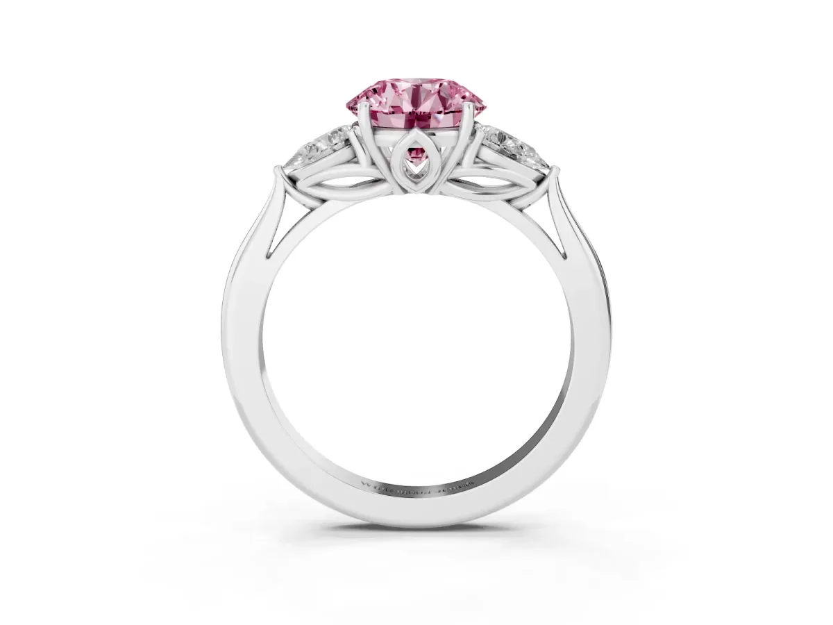 Fancy Pink Three-Stone Round Cut Brilliant Diamond Solitaire Ring with Tapered Band and Four-Prong Setting Silver