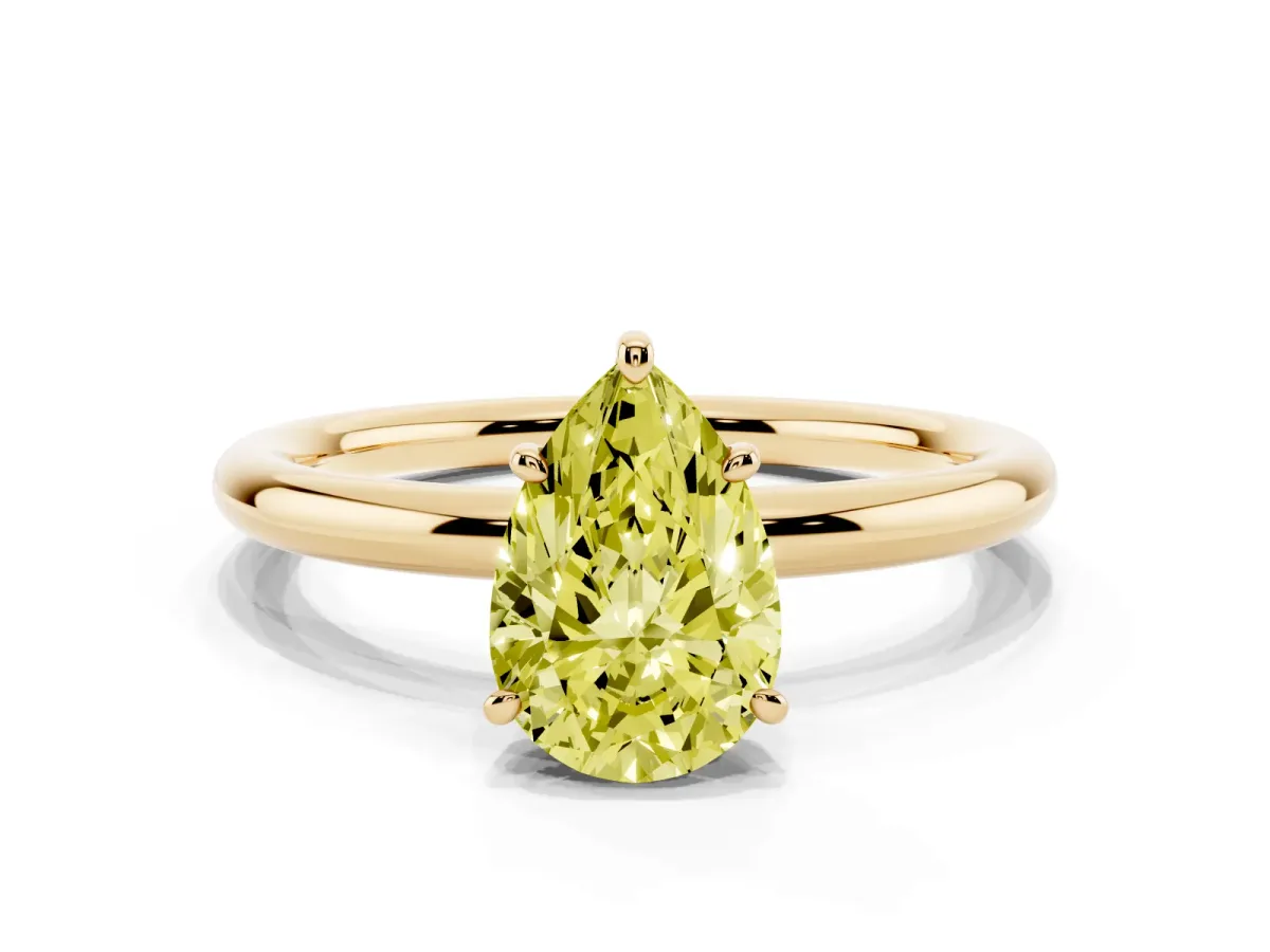 Fancy Yellow Pear Cut Solitaire Diamond Ring with Four-Prong Setting on a Plain Band Yellow gold