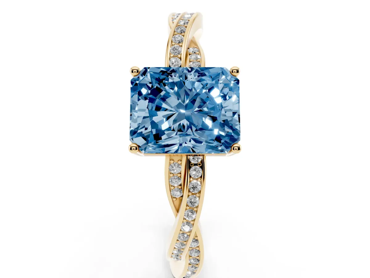 Fancy Blue Radiant Cut Solitaire Twisted Pave Diamond Ring with Four-Prong Setting Yellow gold