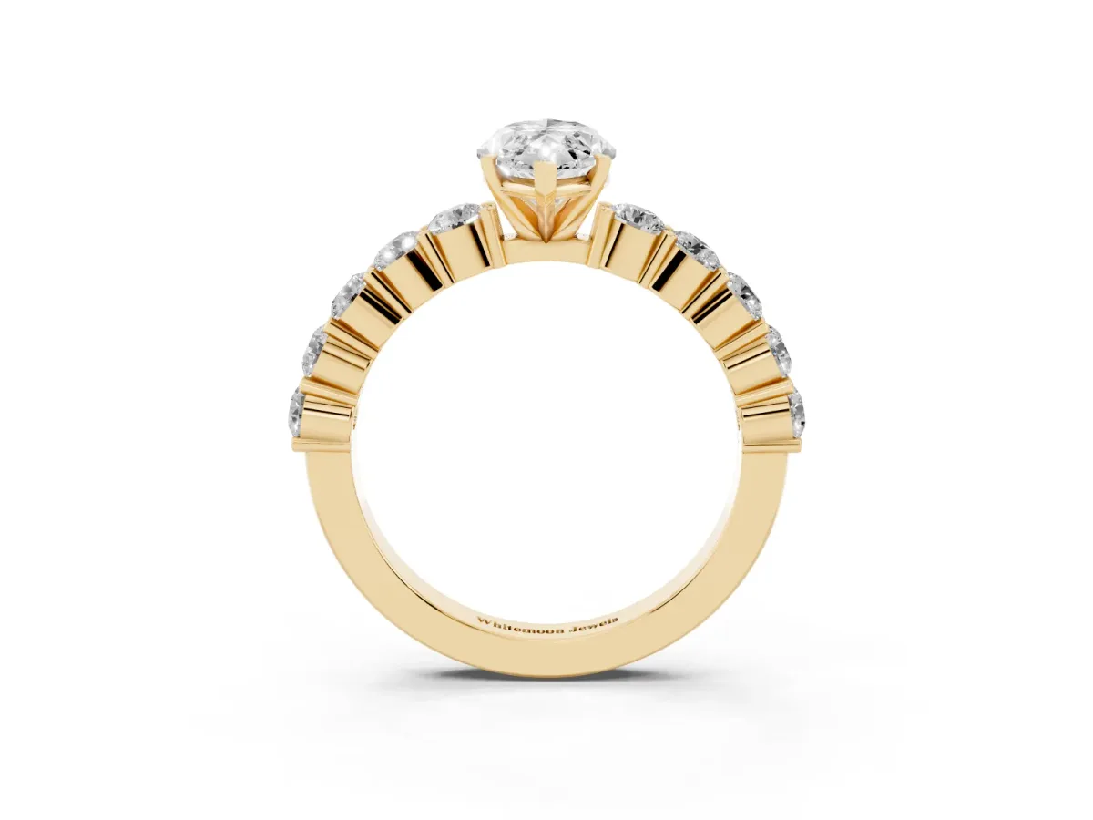 Marquise Cut Diamond Solitaire Ring with Shared Prong Round Side Stones Yellow gold