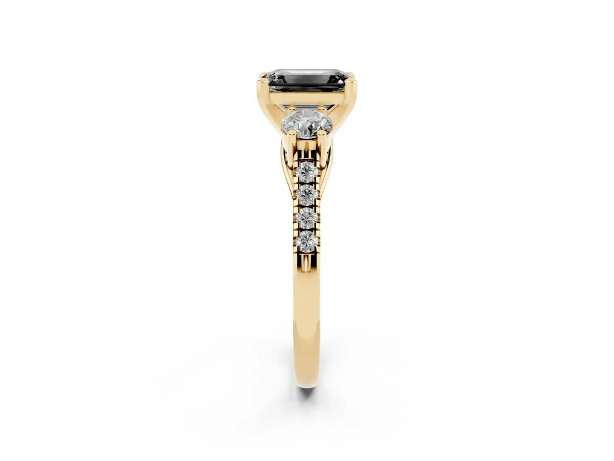 Fancy Black Three-Stone Emerald Cut Diamond Pavé Band with Four-Prong Setting Yellow gold