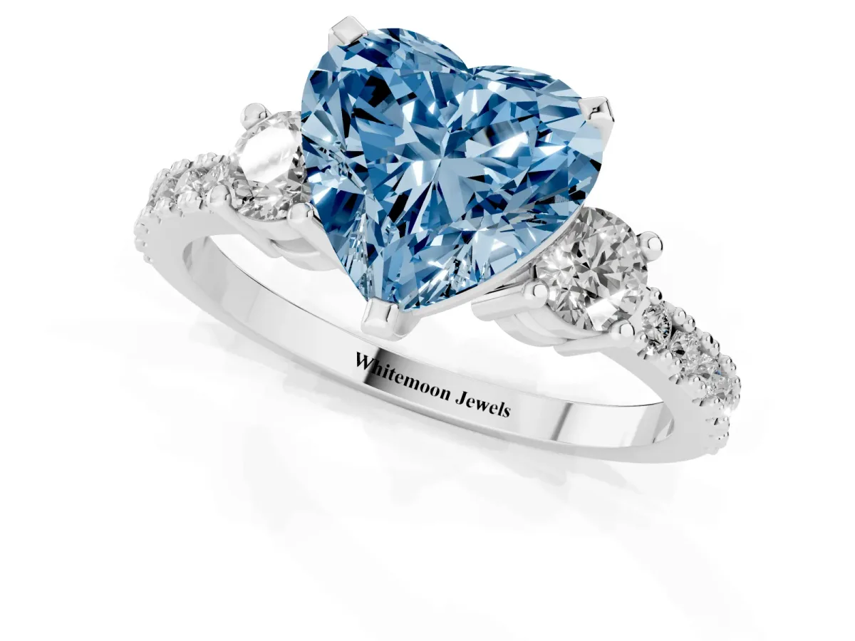 Fancy Blue Heart Cut Three-Stone Diamond Pavé Band with Prong Setting Platinum
