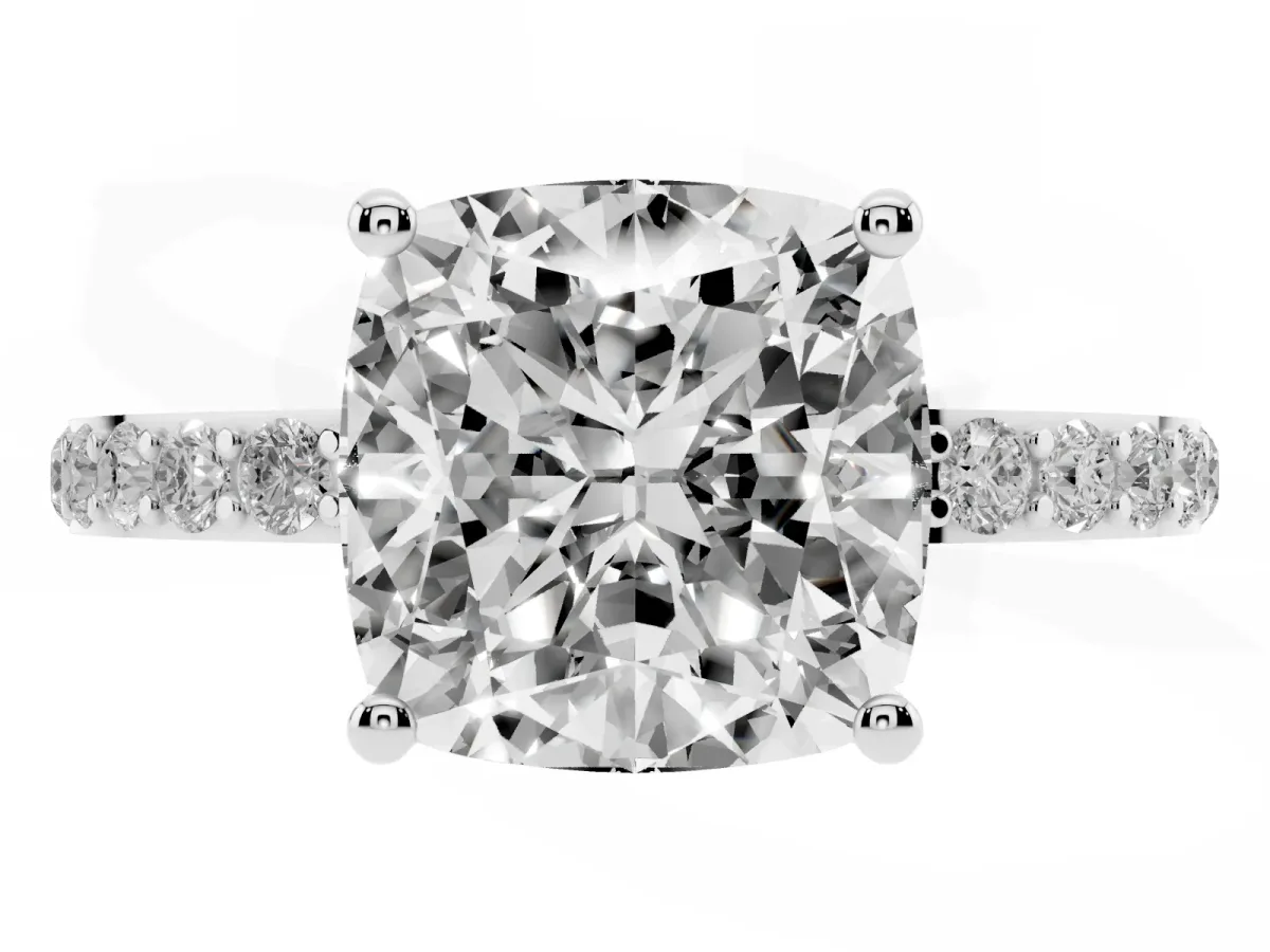 Cushion Cut Diamond Solitaire Ring with Round Pavé Shoulders and Prong Setting Platinum