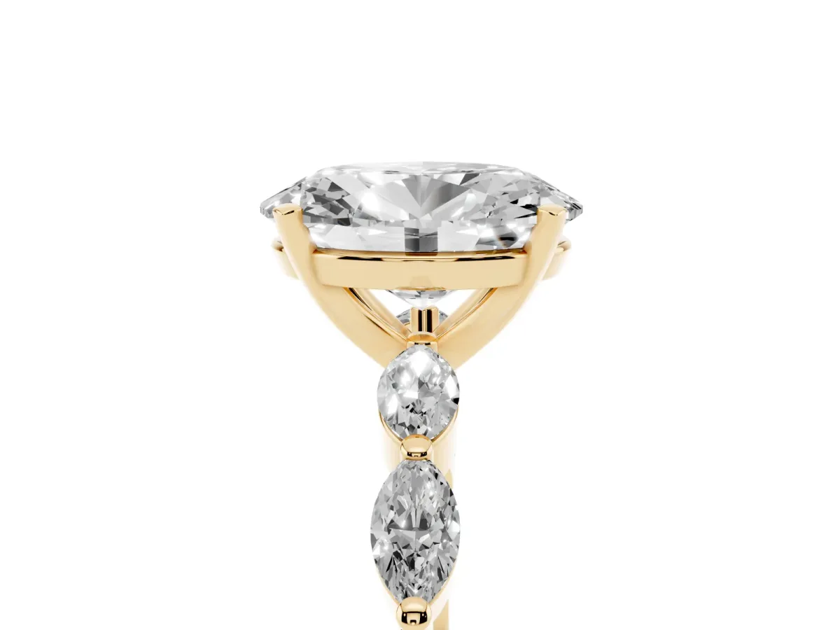Oval Cut Diamond Ring with Marquise Side Stones and Prong Setting Yellow gold