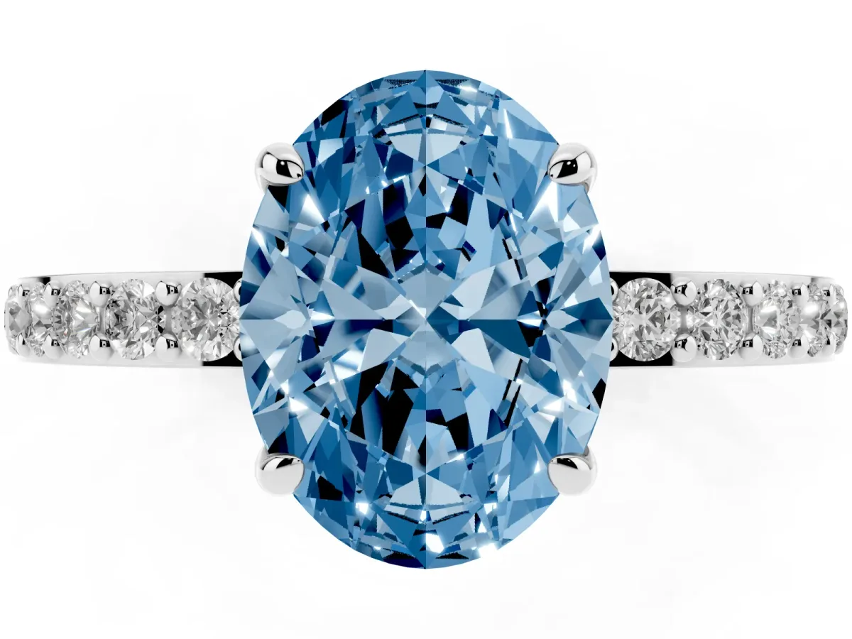 Fancy Blue Oval Cut Diamond Pavé Engagement Ring with Round Accents and Prong Setting Platinum