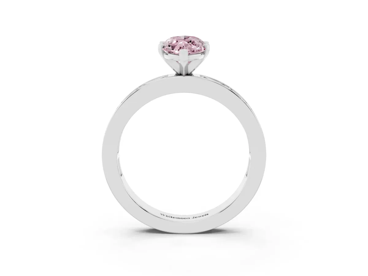 Fancy Pink Marquise Cut Solitaire Diamond Ring with Channel-Set Baguette Band and Four-Prong Setting Silver