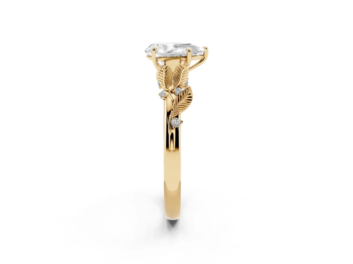 Pear Cut Diamond Solitaire Ring with Leaf Motif Band and Four-Prong Setting Yellow gold
