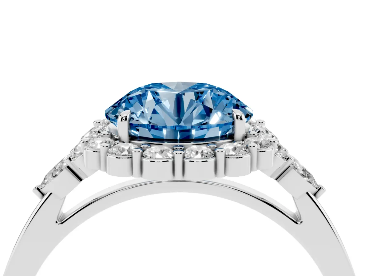 Fancy Blue Round Cut Diamond Halo Ring with Pear Side Stones and Prong Setting Silver