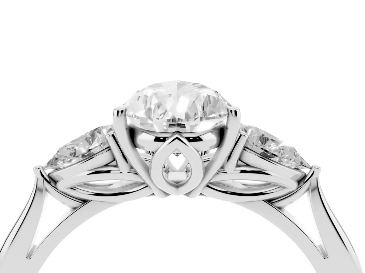 Three-Stone Pear Cut Brilliant Diamond Solitaire Ring with Tapered Band and Four-Prong Setting Platinum