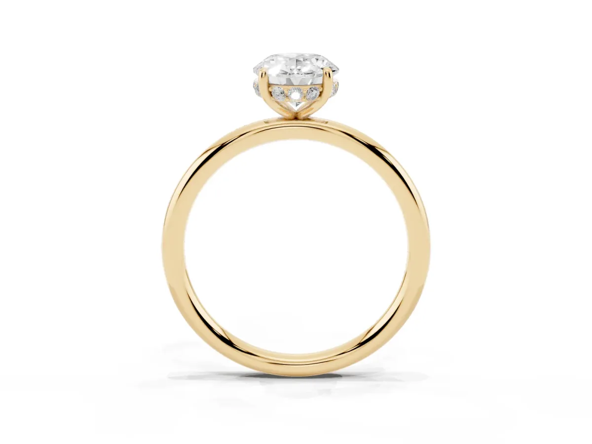 Oval Cut Solitaire Diamond Ring with a Classic Band and Four-Prong Setting Yellow gold
