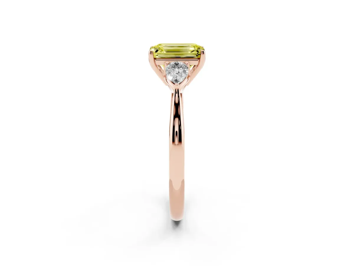 Fancy Yellow Three-Stone Emerald Cut Brilliant Diamond Solitaire Ring with Tapered Band and Four-Prong Setting Rose gold