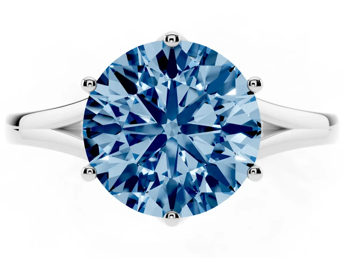 Fancy Blue Round Cut Solitaire Diamond Ring with Six-Prong Setting and Tapered Band Silver