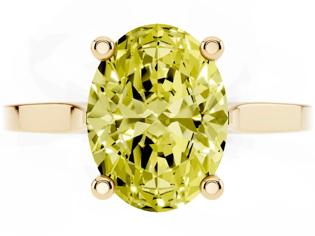 Fancy Yellow Oval Cut Solitaire Diamond Ring with Four-Prong Setting and Tapered Band Yellow gold