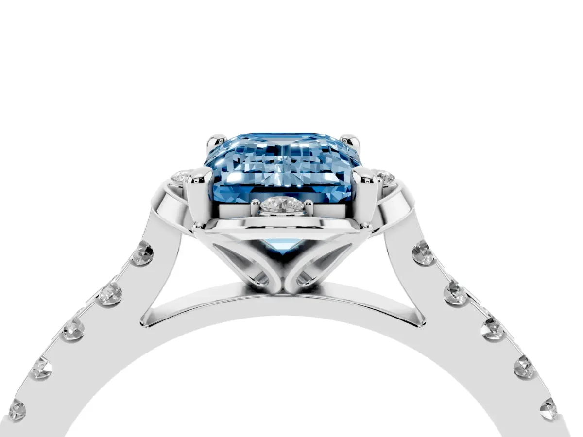 Fancy Blue Emerald Cut Diamond Ring with Pavé Band and Floral Prong Setting Silver