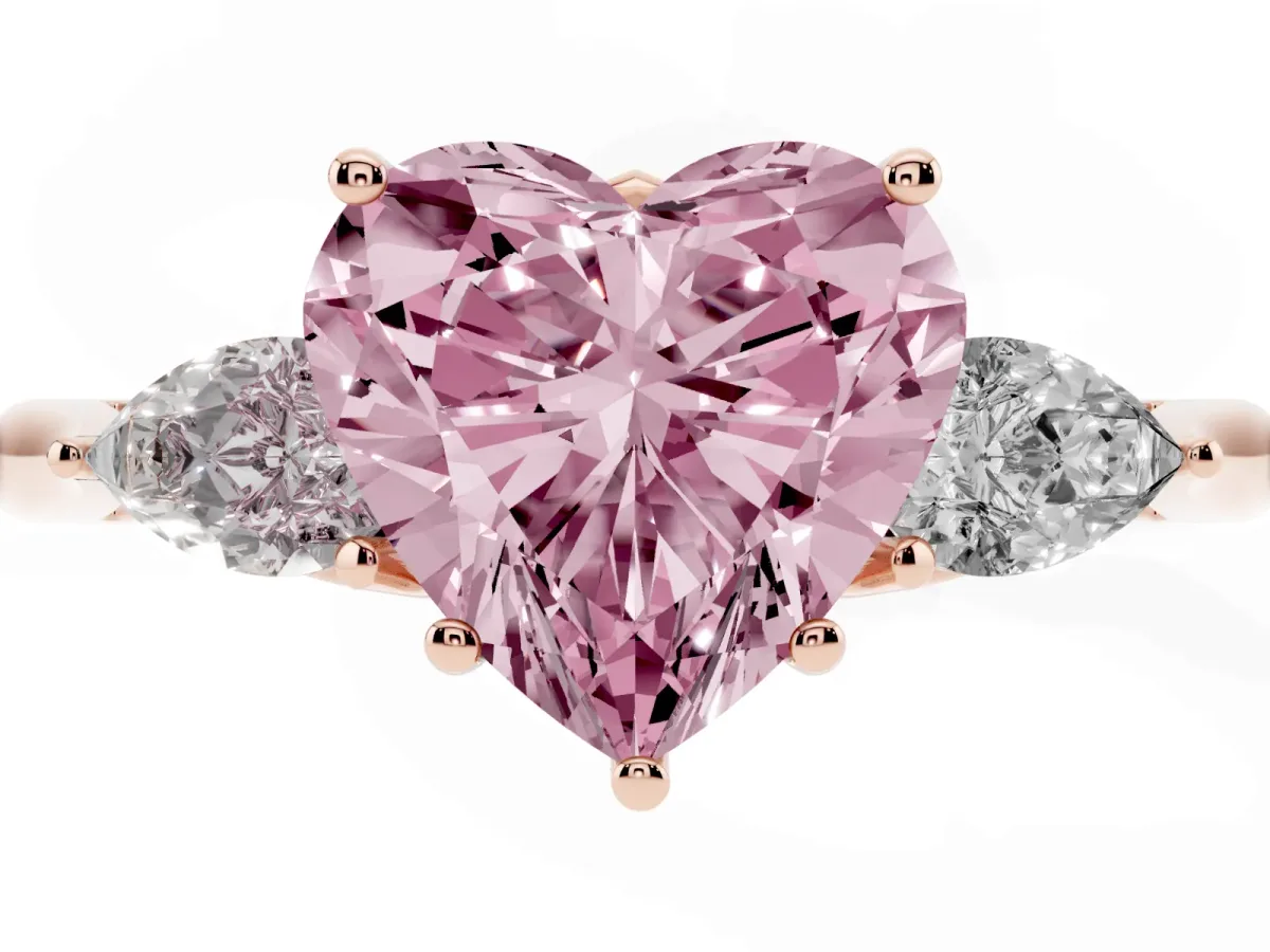 Fancy Pink Heart Cut Diamond Three-Stone Ring with Pear Side Stones and Prong Setting Rose gold