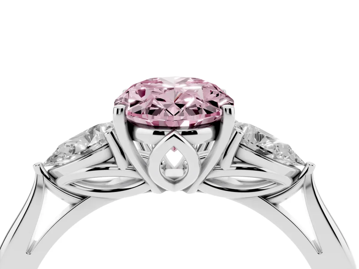 Fancy Pink Three-Stone Oval Cut Diamond Ring with Pear Side Stones in Four-Prong Setting Platinum