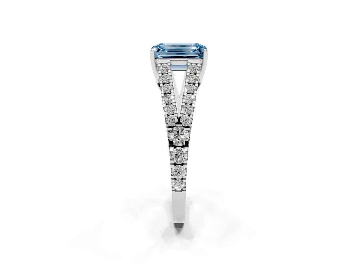 Fancy Blue Emerald Cut Diamond Split Shank Engagement Ring with Round Pavé and Prong Setting Platinum