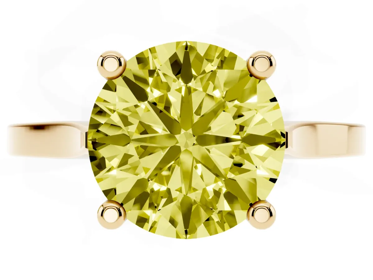 Fancy Yellow Round Cut Solitaire Diamond Ring with Four-Prong Setting and Tapered Band Yellow gold