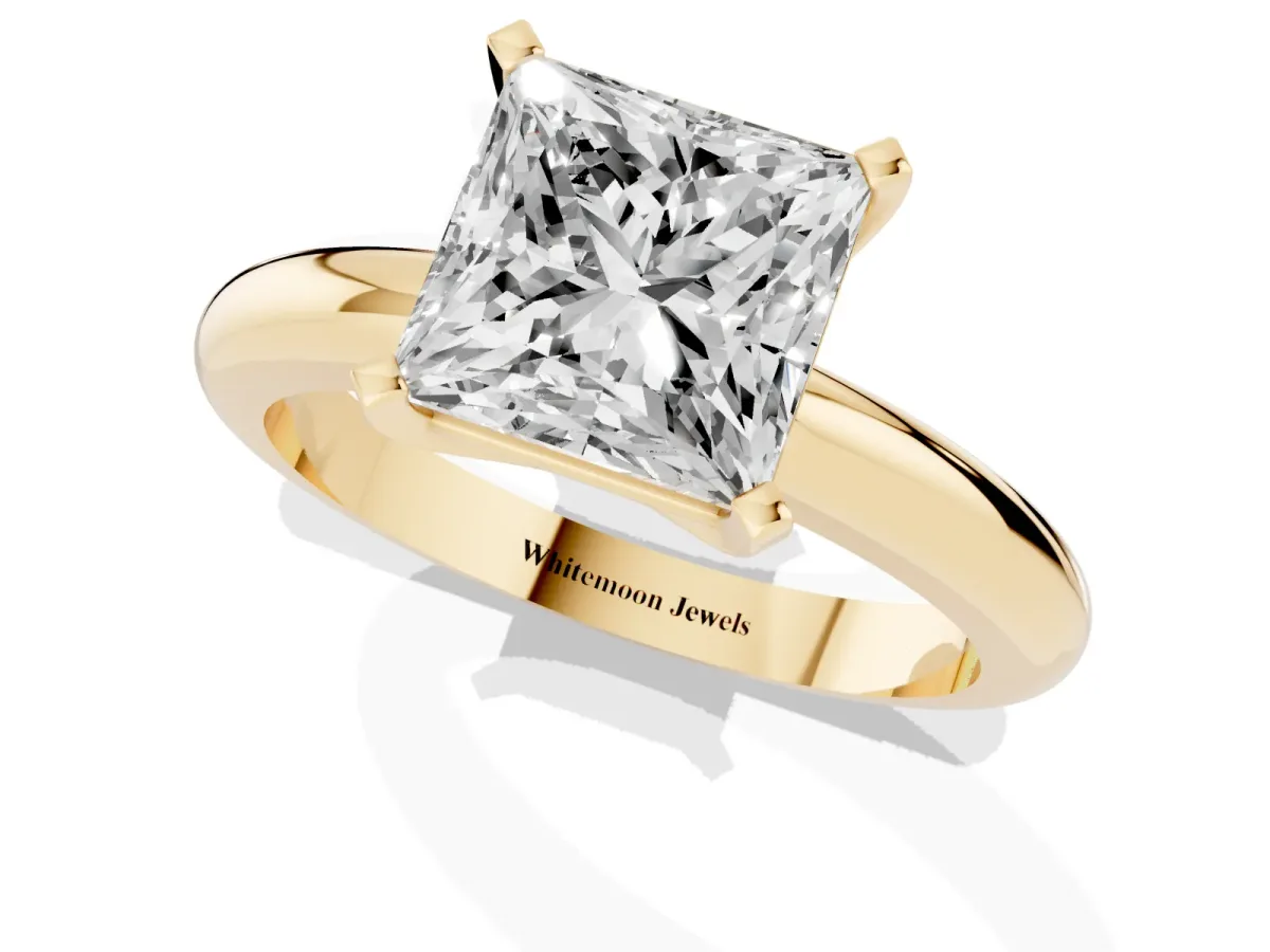 Princess Cut Diamond Solitaire Engagement Ring with Round Band and Four-Prong Setting Yellow gold