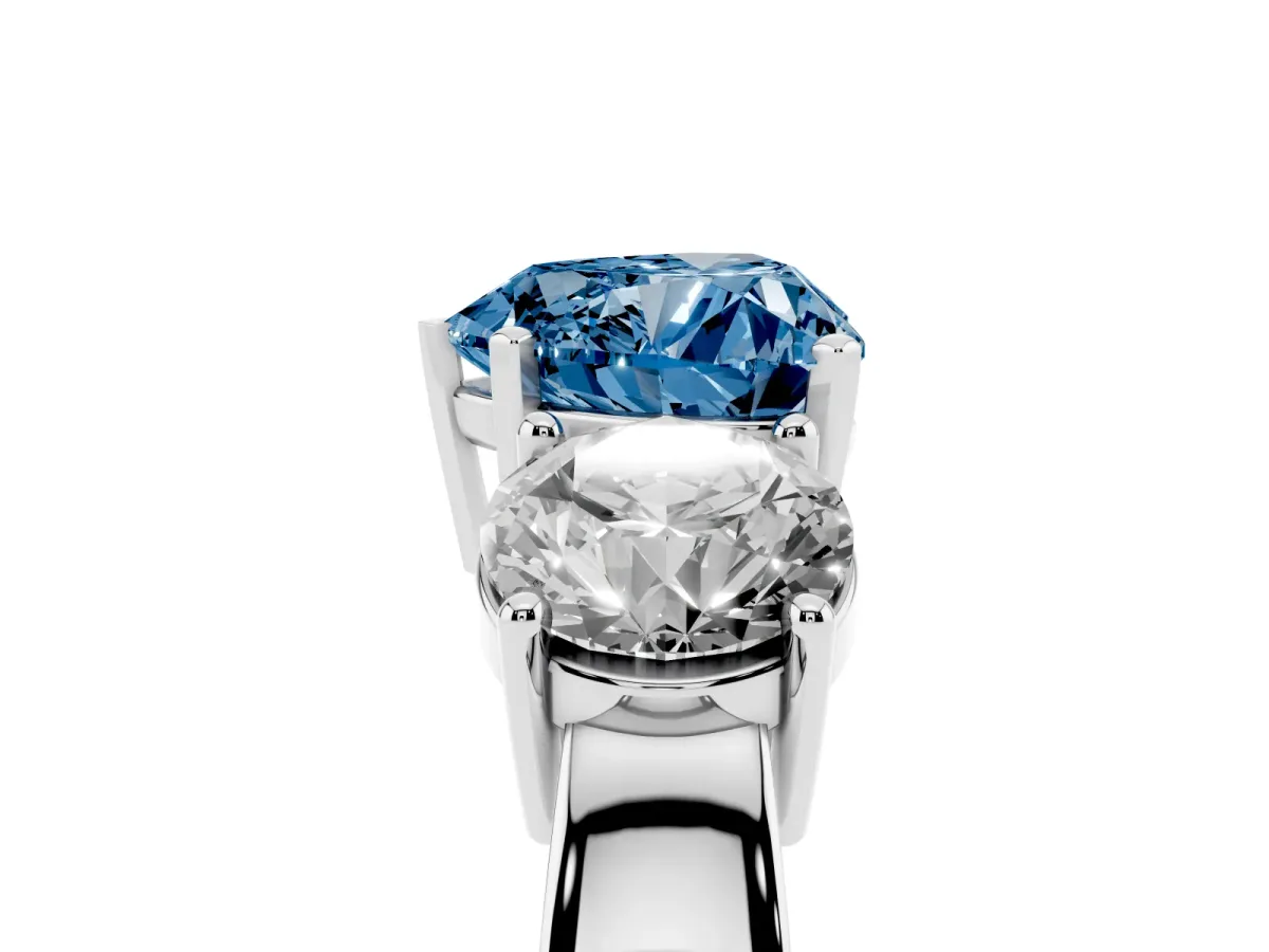 Fancy Blue Three-Stone Heart Cut Diamond Ring with Round Side Stones, Classic Band, and Four-Prong Setting Platinum