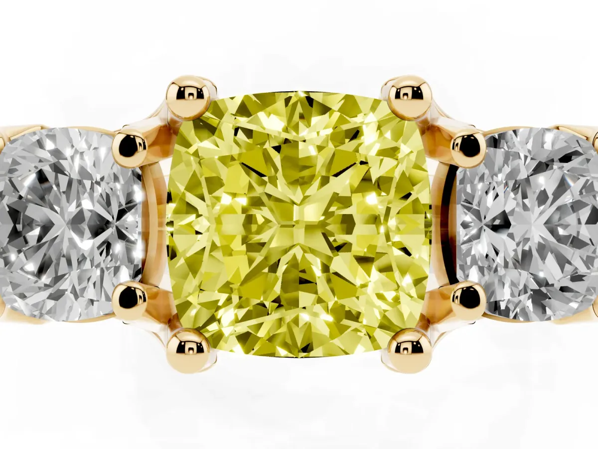Fancy Yellow Cushion Cut Diamond Three-Stone Ring with Channel Set Band and Four-Prong Setting Yellow gold