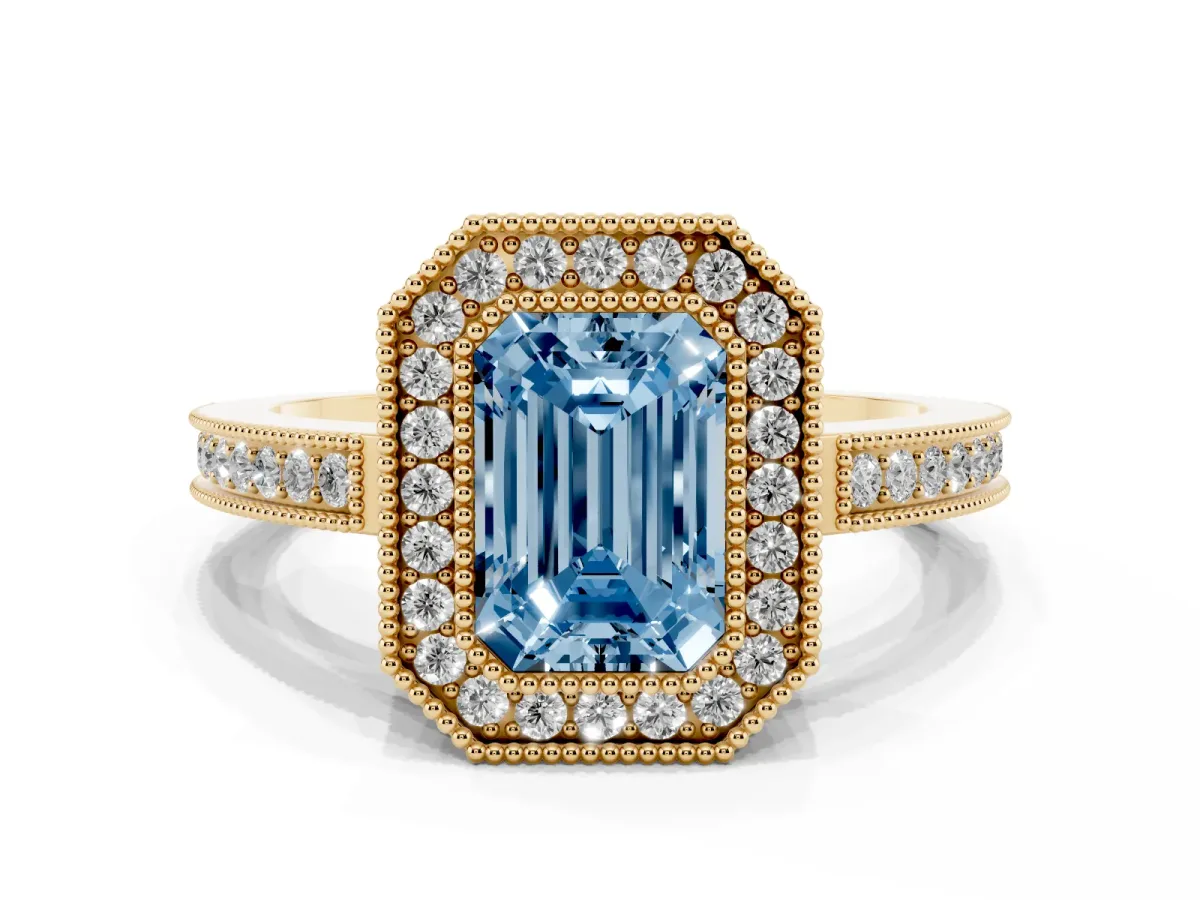 Fancy Blue Emerald Cut Cut Halo Diamond Ring with Pavé Band and Milgrain Prong Setting Yellow gold