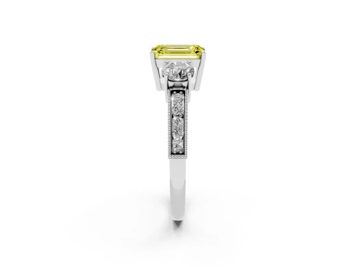 Fancy Yellow Emerald Cut Three-Stone Diamond Ring with Pavé Band and Four-Prong Setting Platinum