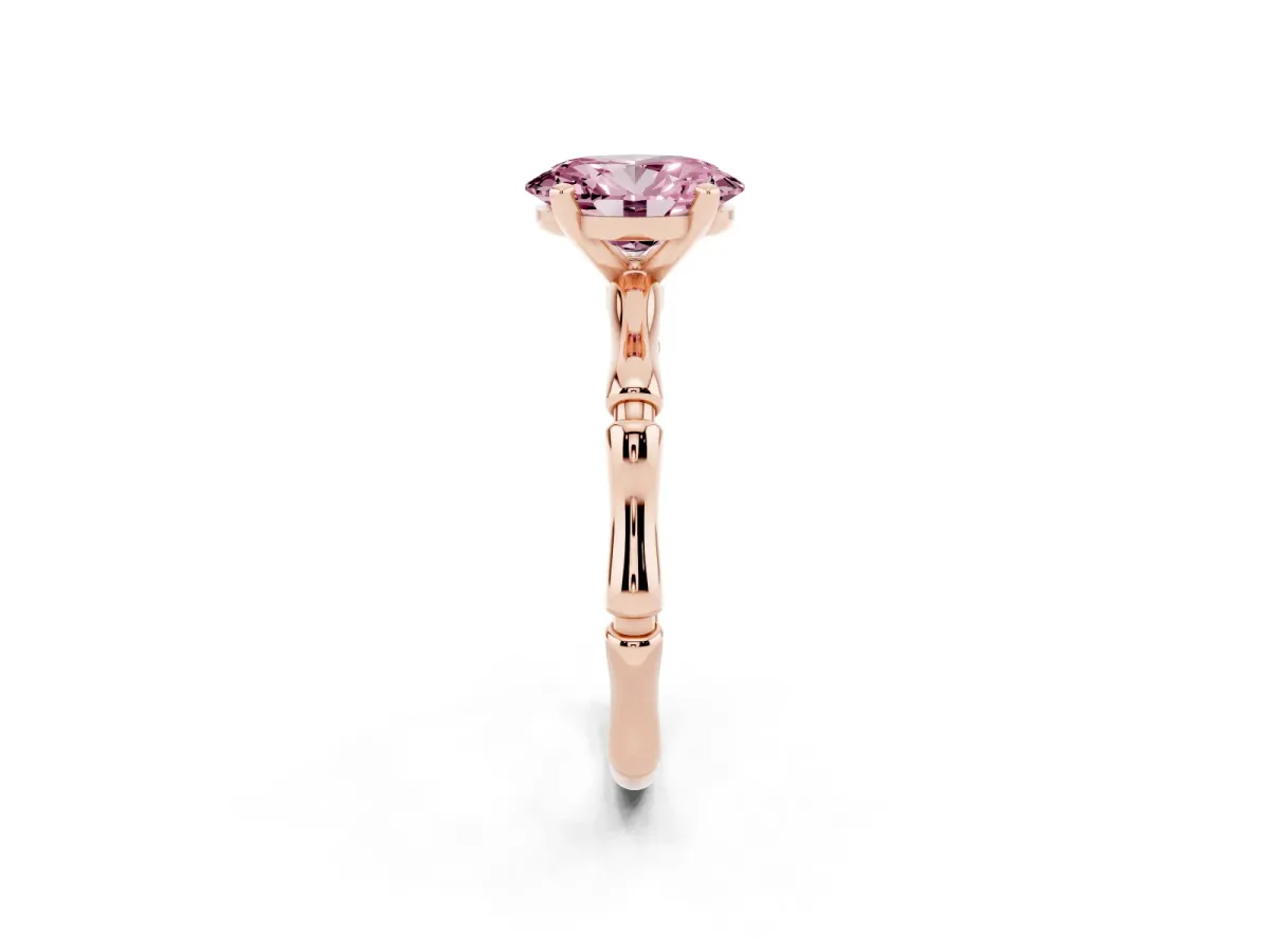 Fancy Pink Oval Cut Solitaire Diamond Ring with Bamboo Band and Four-Prong Setting Rose gold