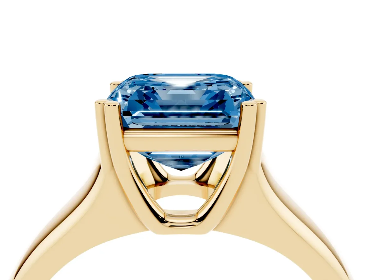 Fancy Blue Asscher Cut Diamond Solitaire Ring with Wide Band and Prong Setting Yellow gold