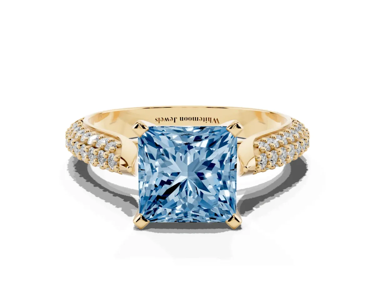 Fancy Blue Princess Cut Diamond Solitaire Engagement Ring with Multi-Row Round Pavé Band and Prong Setting Yellow gold