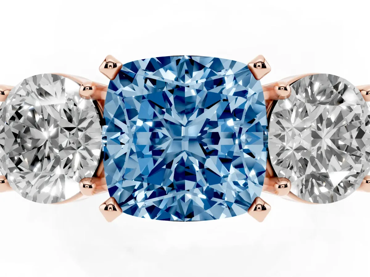Fancy Blue Three-Stone Cushion Cut Diamond Ring with Round Side Stones, Classic Band, and Four-Prong Setting Rose gold