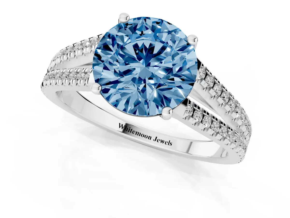 Fancy Blue Round Cut Diamond Solitaire Engagement Ring with Split Shank Pavé Band Platinum