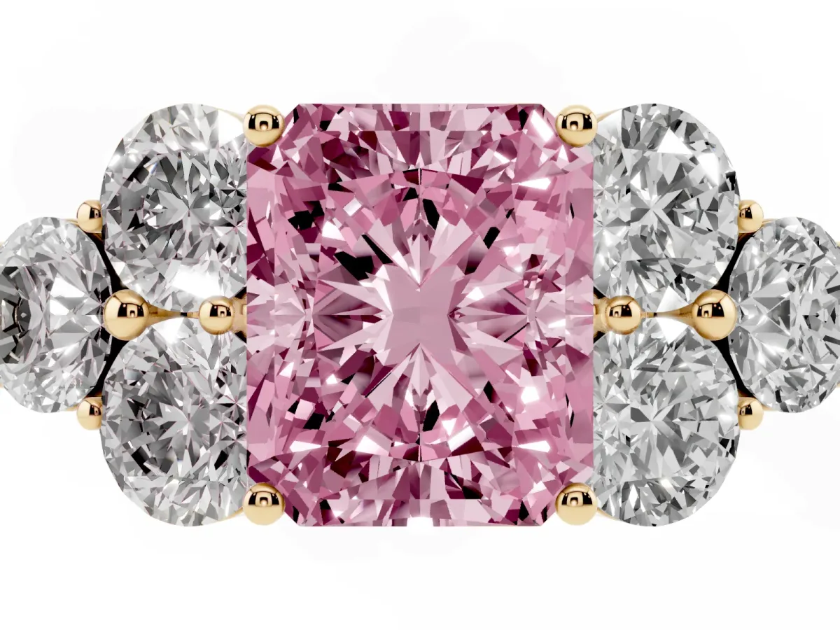 Fancy Pink Radiant Cut Cut Diamond Cluster Ring with Round Accent Stones and Prong Setting on a Classic Band Yellow gold