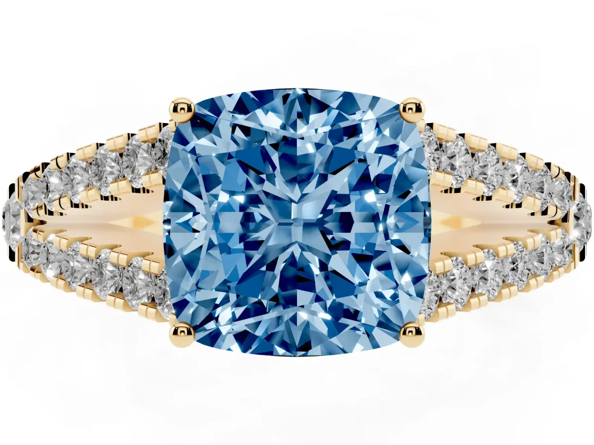 Fancy Blue Cushion Cut Diamond Split Shank Engagement Ring with Round Pavé and Prong Setting Yellow gold