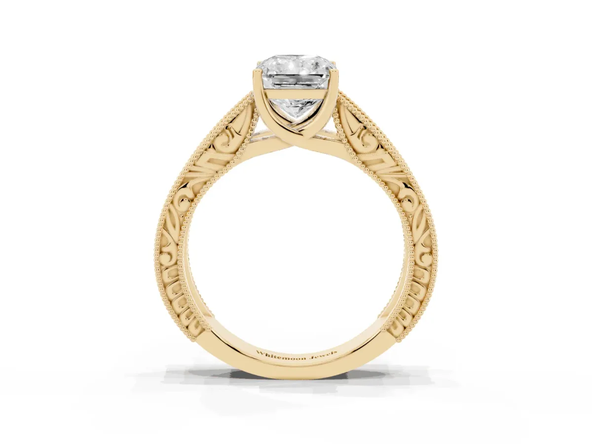 Radiant Cut Diamond Solitaire Ring with Engraved Band and Four-Prong Setting Yellow gold