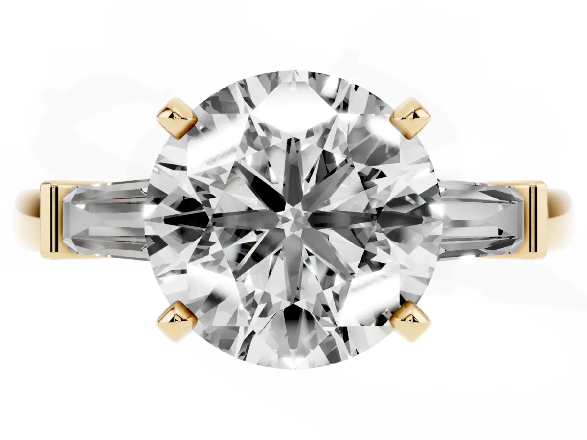 Round Cut Cut Diamond Solitaire Ring with Tapered Baguette Accents and Four-Prong Setting Yellow gold