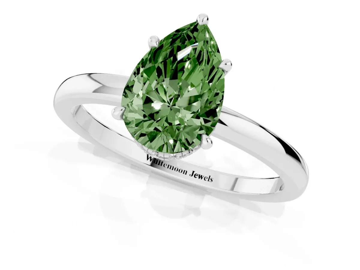 Fancy Green Pear Cut Solitaire Engagement Ring with Cathedral Band and Four-Prong Setting Silver