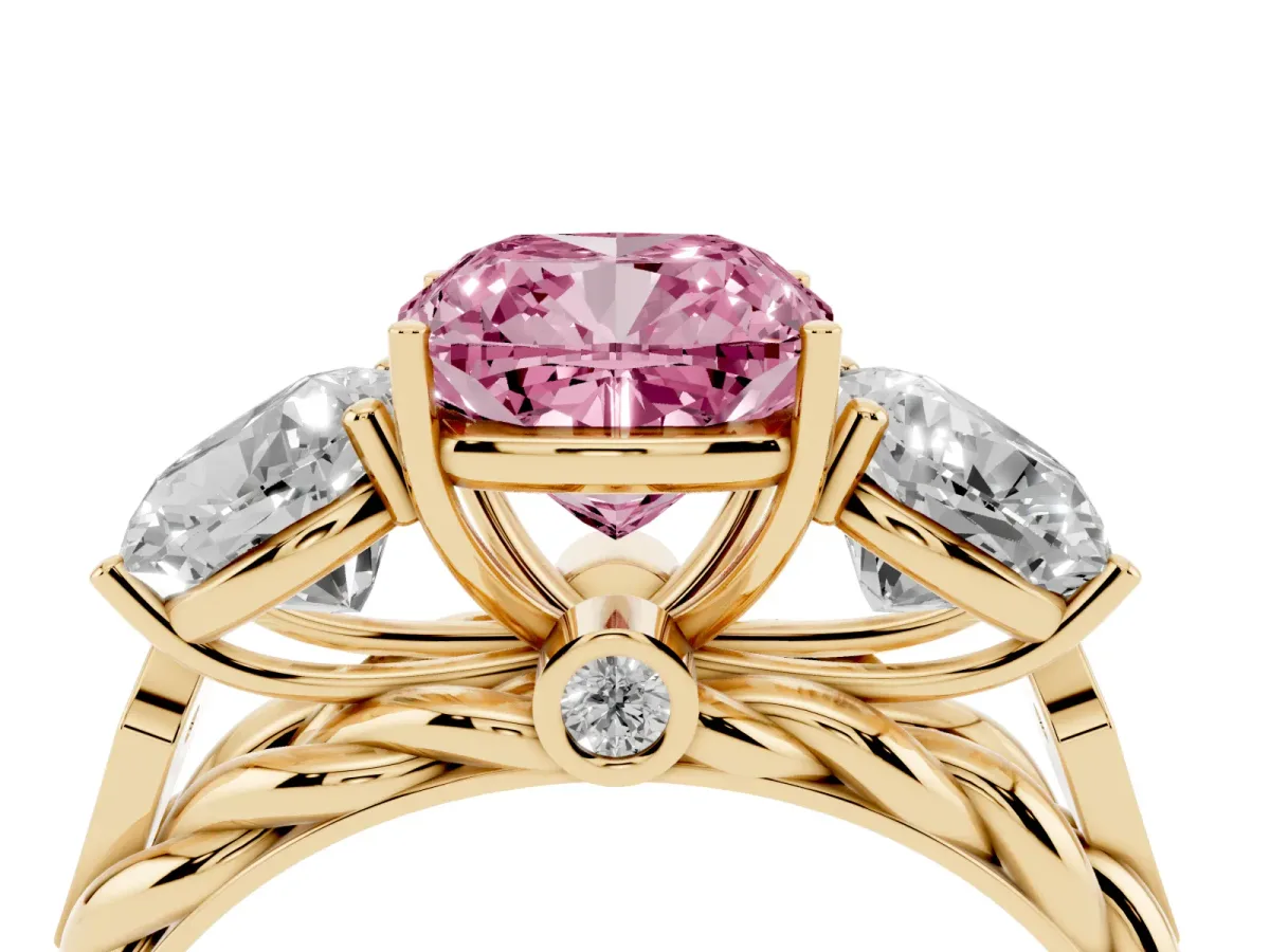 Fancy Pink Three-Stone Cushion Cut Diamond Braided Band Ring with Four-Prong Setting Yellow gold