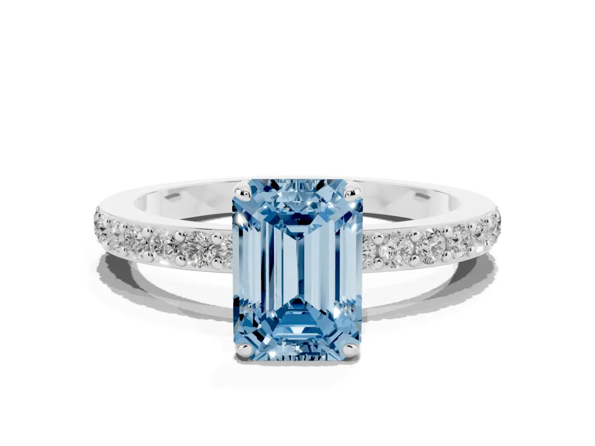 Fancy Blue Emerald Cut Diamond Solitaire Engagement Ring with Pavé Band and Four-Prong Setting Silver