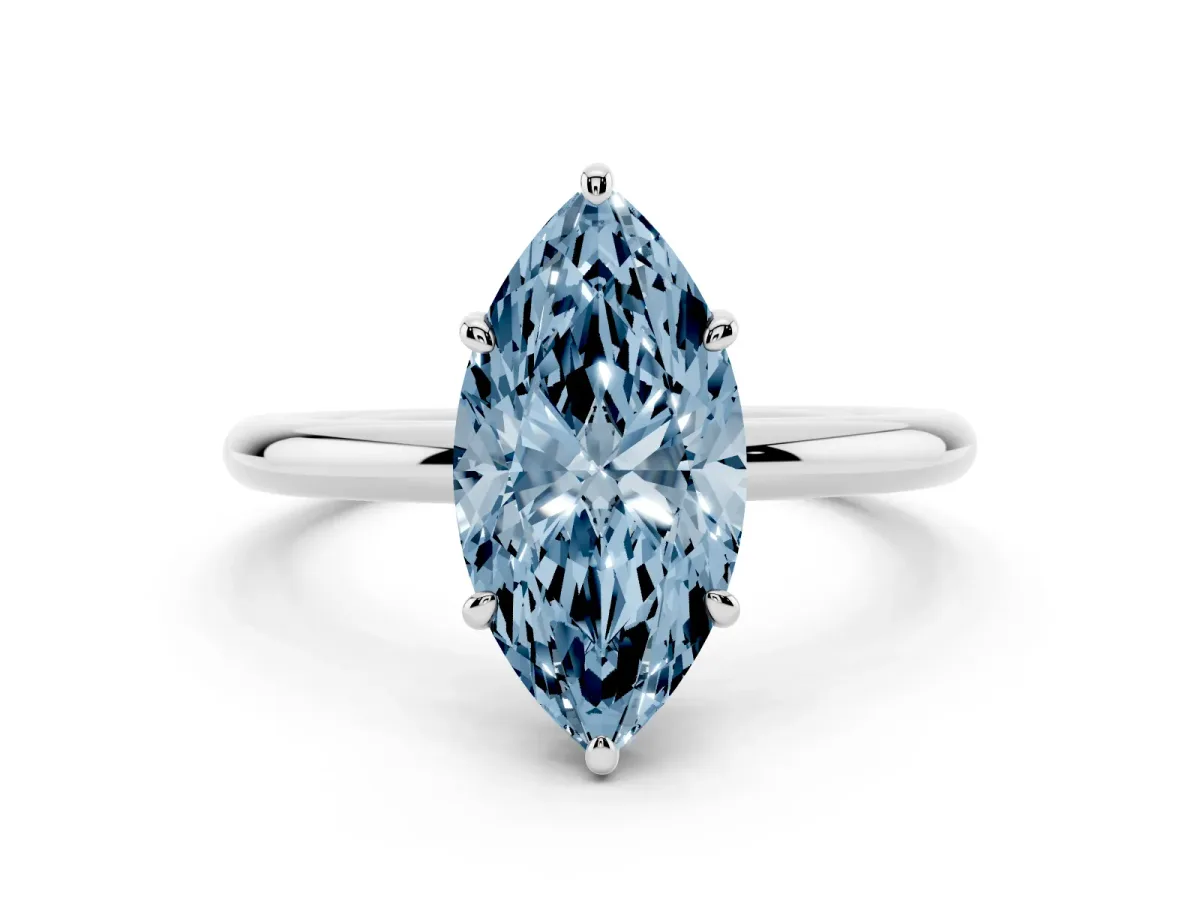 Fancy Blue Oval Cut Solitaire Diamond Ring with Four-Prong Setting on a Plain Band Platinum
