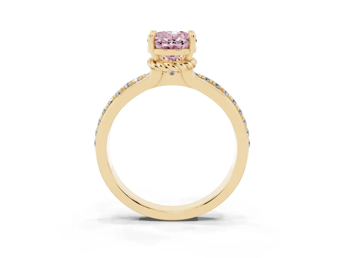 Fancy Pink Oval Cut Solitaire Diamond Ring with Channel Set Band and Six-Prong Setting Yellow gold